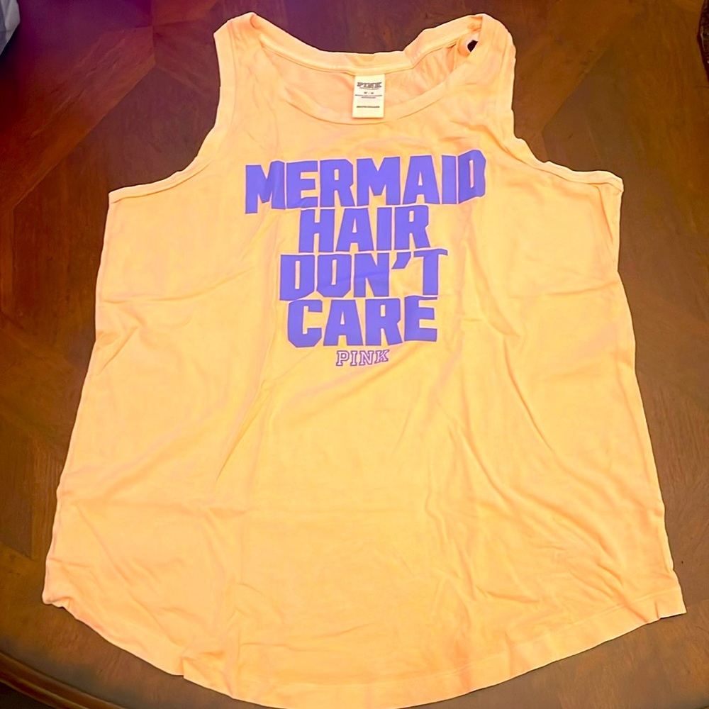 NWOT Victoria’s Secret PINK running tank size Medium.  Soft, never worn.